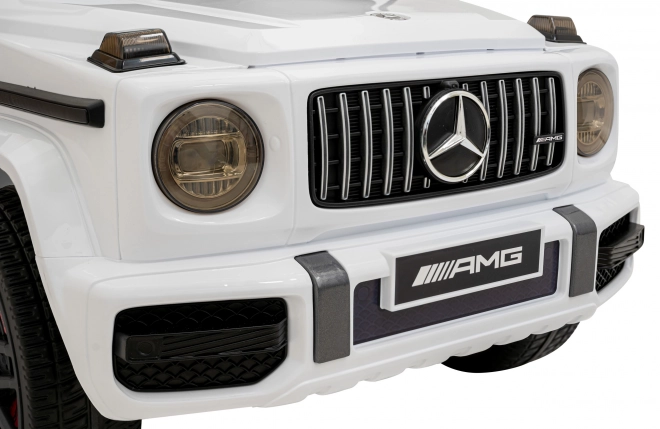 Mercedes AMG G63 pro děti bílý + dálkové ovládání + MP3 LED + pomalý start + EVA + pásy