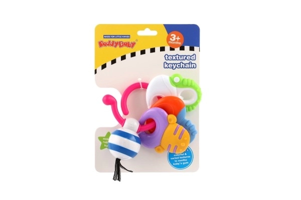 Chrastítko/Kousátko přívěsek s tvary plast 14x11cm na kartě 3m+
