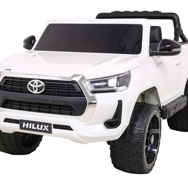 Toyota Hilux baterie pro děti Bílá + pohon 4x4 + dálkové ovládání + 2 nosiče zavazadel + rádio MP3 + LED dioda