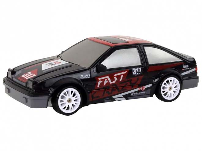 Dálkově ovládané sportovní auto R/C 1:24 černá vyměnitelná kola