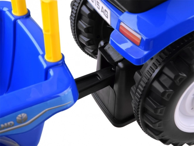 Jeźdżącí traktor s přívěsem New Holland