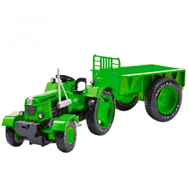 Kovový traktor s přívěsem zelený 1:18