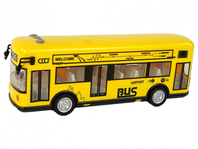 Žlutý městský autobus s třecím pohonem 1:18