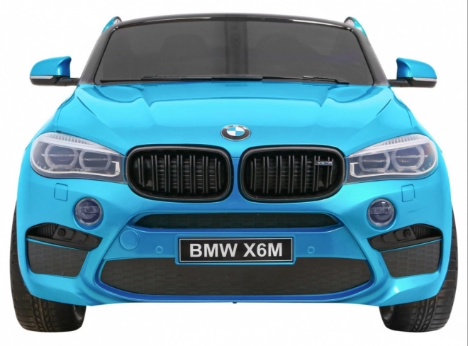 BMW X6M XXL pro 2 děti Modrá barva + Pilot + Eco kůže + Bezpečnostní pásy + Pomalý start + MP3 + LED