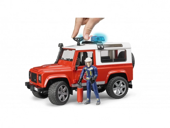 Bruder Hasičské auto Land Rover s figurkou