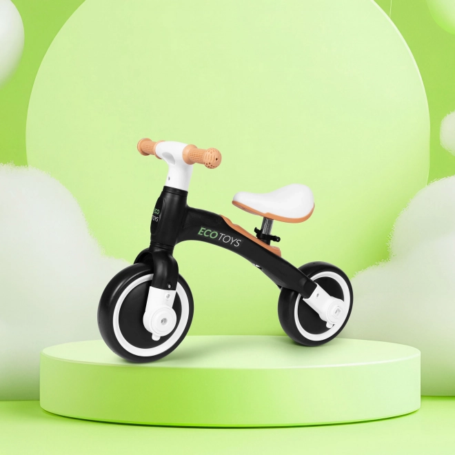 Odrážedlo s pedály a postranními kolečky černé ECOTOYS