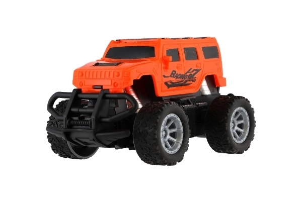 Auto RC mini truck plast 12cm 27MHz na baterie se světlem oranžové v krabici 18x11,5x10cm