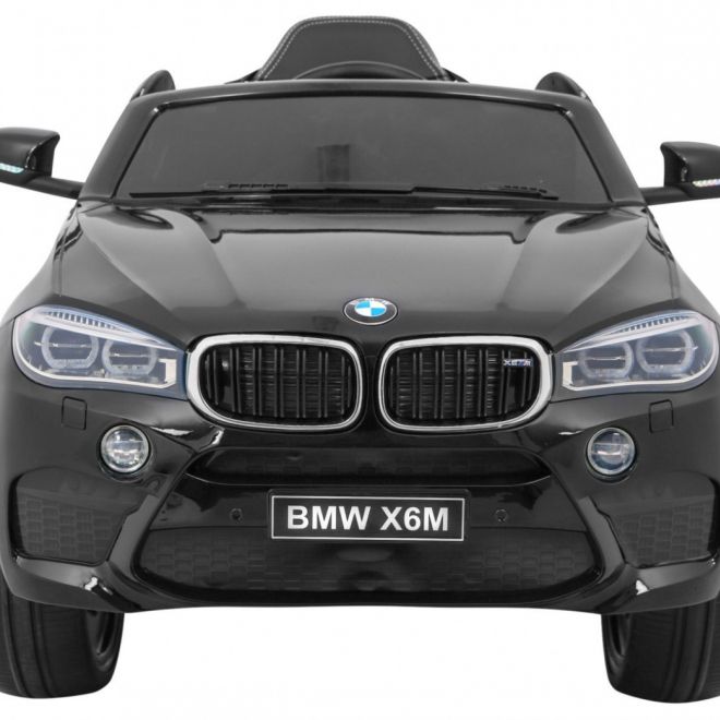 BMW X6M Elektrické dětské auto černé + dálkové ovládání + EVA + pomalý start + audio panel + LED dioda