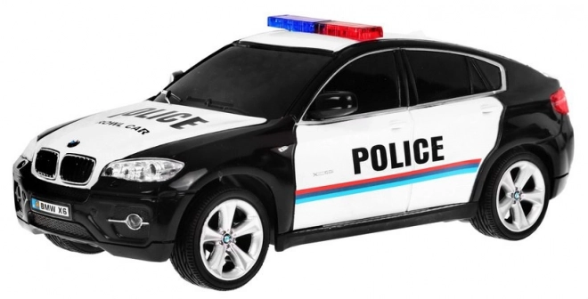 Policejní auto BMW x6 pro děti 8+ Dálkově ovládaná policie 1:24 Světla Rooster