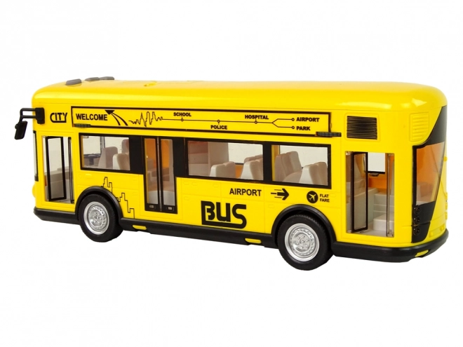 Žlutý městský autobus s třecím pohonem 1:18