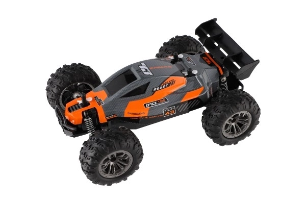 Auto RC Buggy rychlostní 2,4GHz plast 25cm na baterie oranžové v krabici 31x14x18cm