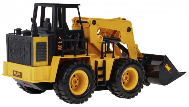 Dálkově ovládaný buldozer pro děti 3+ Model 1:24 Pohyblivý kbelík + zvuky + příslušenství