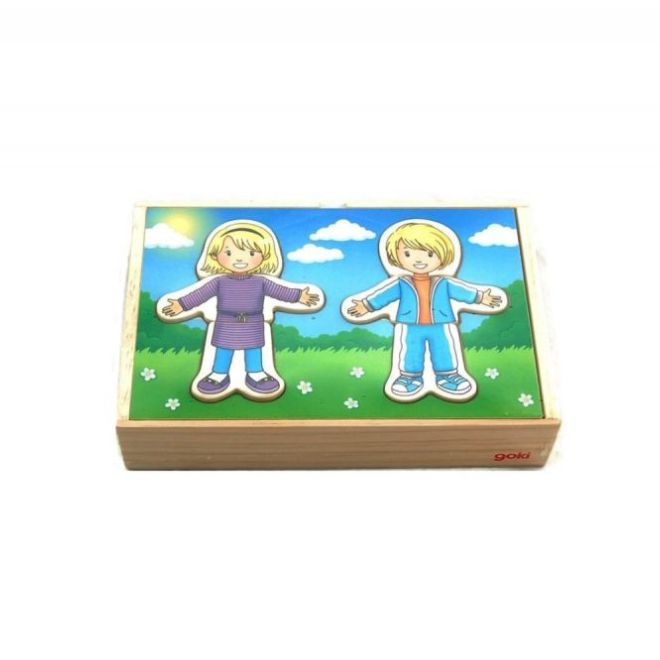 Dřevěné puzzle oblékají chlapce a dívku