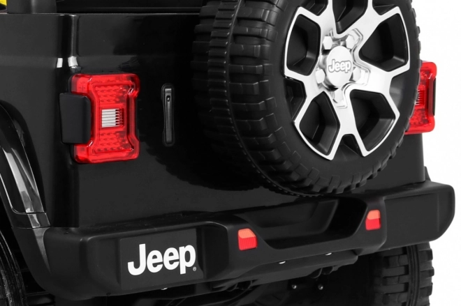 Jeep Wrangler Rubicon baterie pro děti černá + dálkové ovládání + MP3 LED rádio + EVA kola