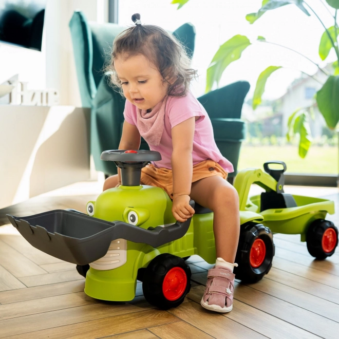 Jezdicí traktor Claas s přívěsem, nakladačem a lžící
