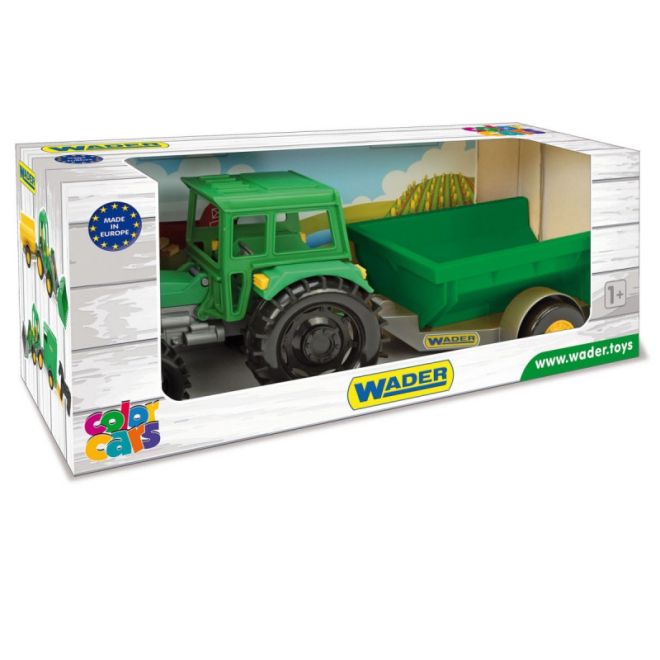 Farmářský traktor s přívěsem v kartonové krabici