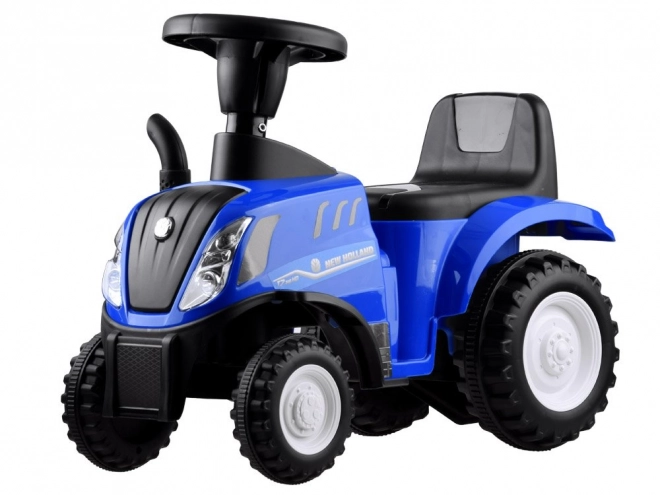 Jeźdżącí traktor s přívěsem New Holland