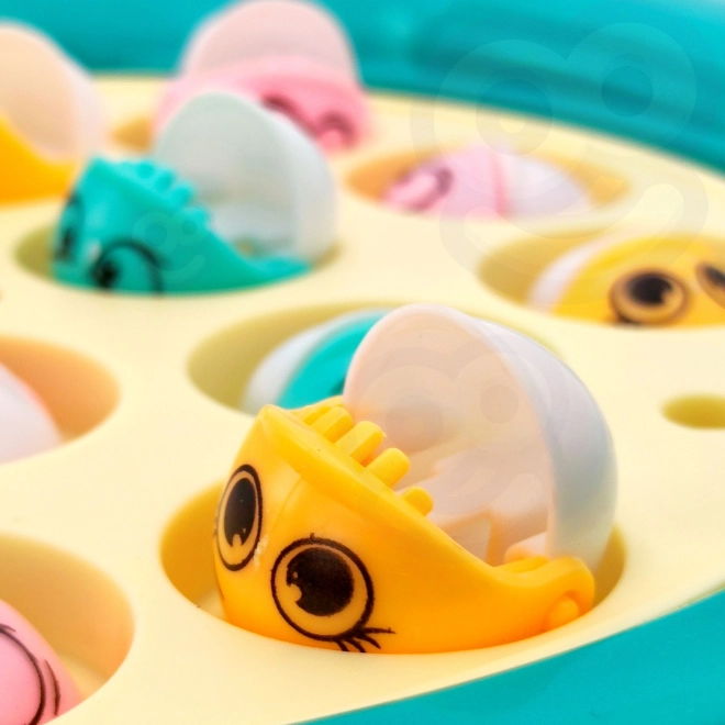Woopie lovení rybiček hra zelený dinosaurus