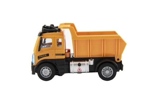 Auto RC nákladní sklápěčka plast 12cm 27MHz na dálk.ovl. na baterie se světlem v krab. 16x18x8cm
