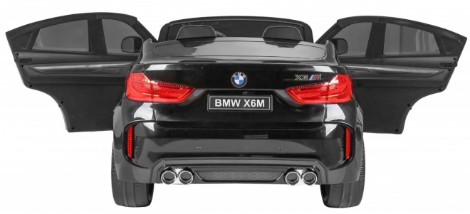 BMW X6M XXL pro 2 děti Černá + Dálkové ovládání + Eko kůže + Bezpečnostní pásy + Pomalý rozjezd + MP3 USB + LED dioda