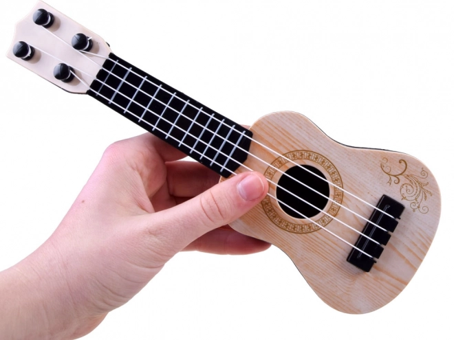 Mini ukulele pro děti 25 cm – krém