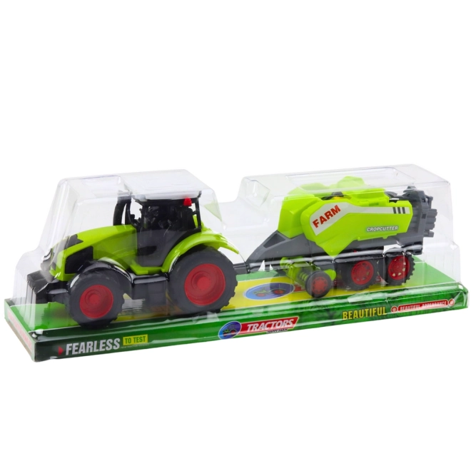 Zelený traktor s lisem na balíky sena