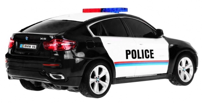 Policejní auto BMW x6 pro děti 8+ Dálkově ovládaná policie 1:24 Světla Rooster