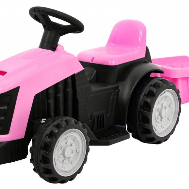 Traktor s přívěsem růžový