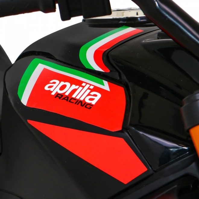 Aprilia Tuono V4 Dětský motocykl na baterie černý + panel MP3 + asistenční kolečka + pomalý start