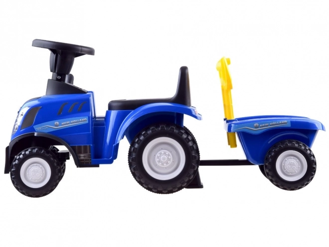 Jeźdżącí traktor s přívěsem New Holland