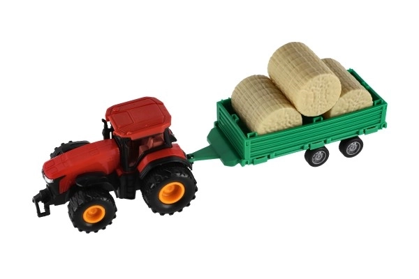 Traktor s vlekem s balíkama plast 30cm na setrvačník 3 barvy v krabici 33x12x9cm