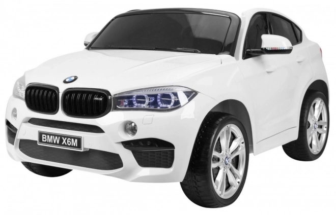 BMW X6M XXL pro 2 děti Bílá + dálkové ovládání + eko kůže + bezpečnostní pásy + pomalý rozjezd + MP3 USB + LED