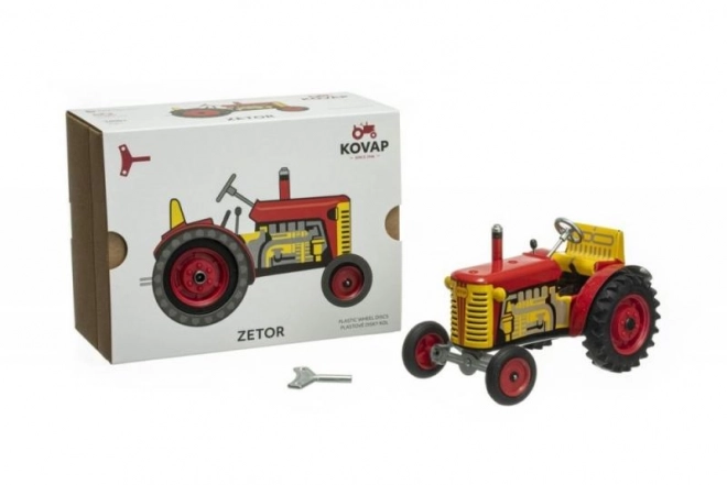 Traktor Zetor červený na klíček kov 14cm 1:25 v krabičce Kovap