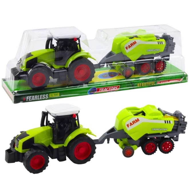 Zelený traktor s lisem na balíky sena