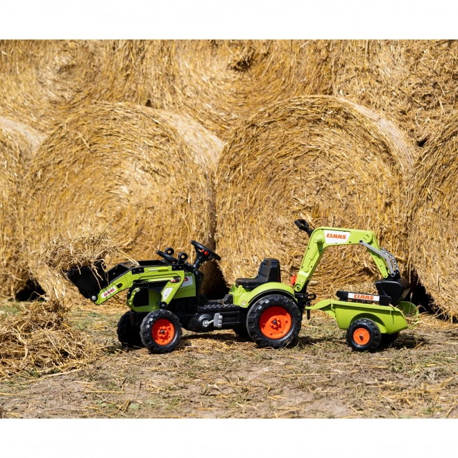Šlapací traktor Claas Arion 410 s radlicí a zadní lžící a valníkem zelený