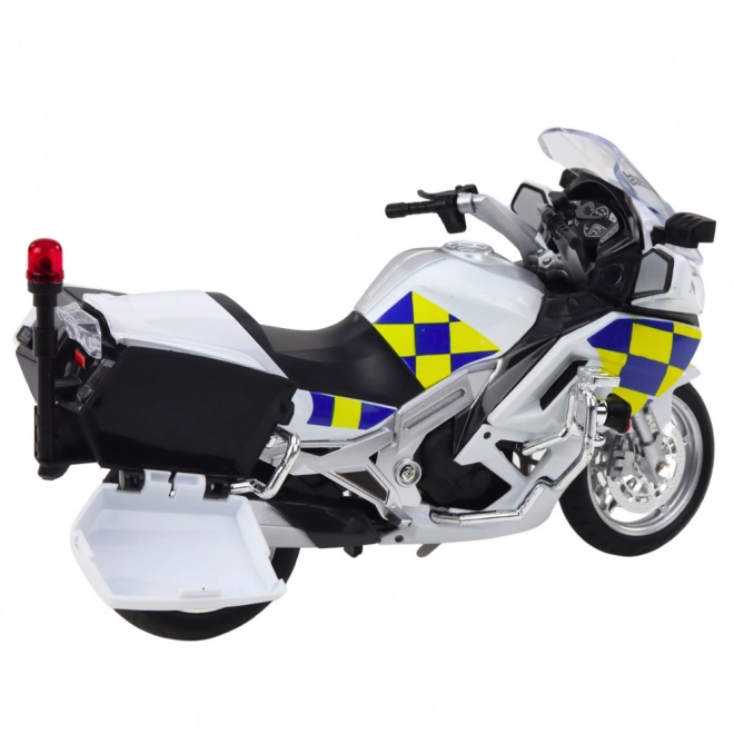 Kovový policejní motocykl s světly a zvuky bílý