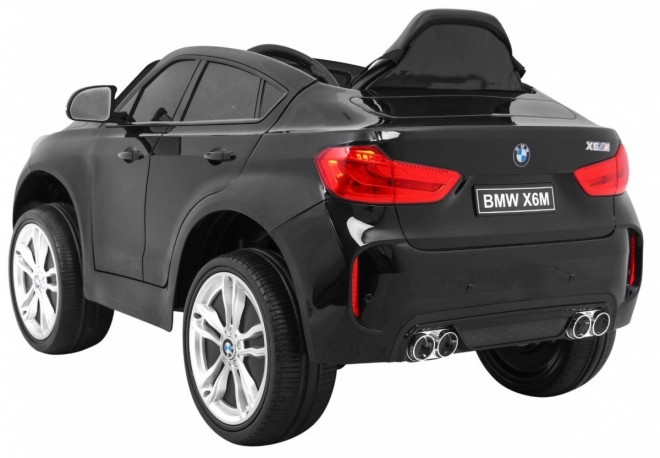 BMW X6M Elektrické dětské auto Lak černá + Dálkové ovládání + EVA + Pomalý start + Audio + LED