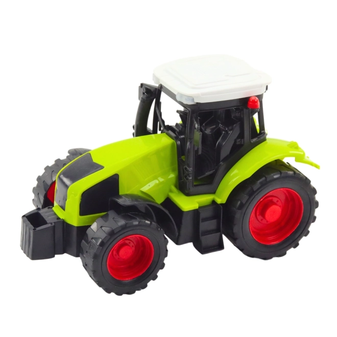 Zelený traktor s lisem na balíky sena