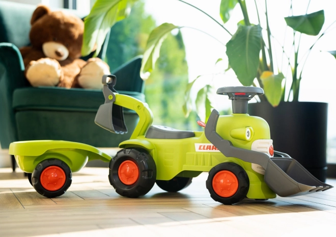 Jezdicí traktor Claas s přívěsem, nakladačem a lžící