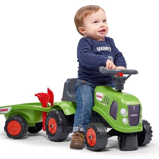 Odstrkovadlo traktor Claas zelené s volantem a valníkem