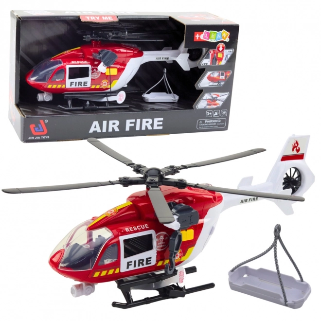 Helikoptéra hasičského sboru s nosítky se světly a zvuky