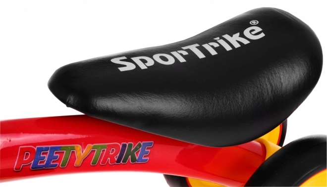 První dětské krosové kolo PettyTrike Červené čtyřkolové kolo SporTrike