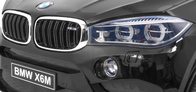 BMW X6M Elektrické dětské auto Lak černá + Dálkové ovládání + EVA + Pomalý start + Audio + LED