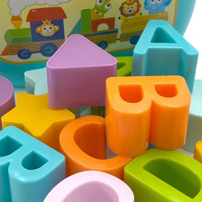 Woopie dětský sorter a kufřík s naukou abecedy a tvarů