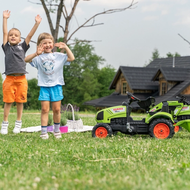 Šlapací traktor Claas Arion 410 s valníkem zelený