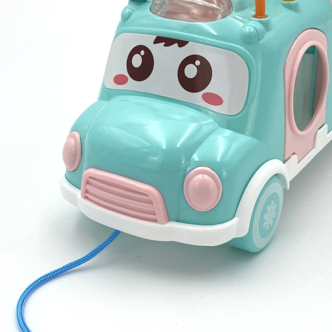 Woopie růžové hudební auto s třídicími prvky a činely