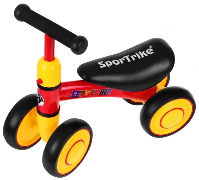 První dětské krosové kolo PettyTrike Červené čtyřkolové kolo SporTrike