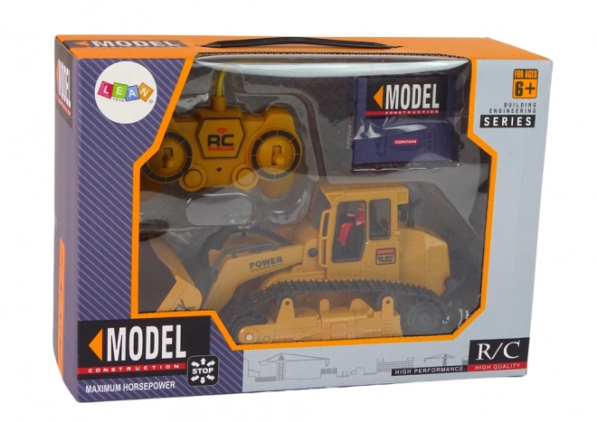 Dálkově ovládaný R/C buldozer Caterpillar 1:22 Bagr