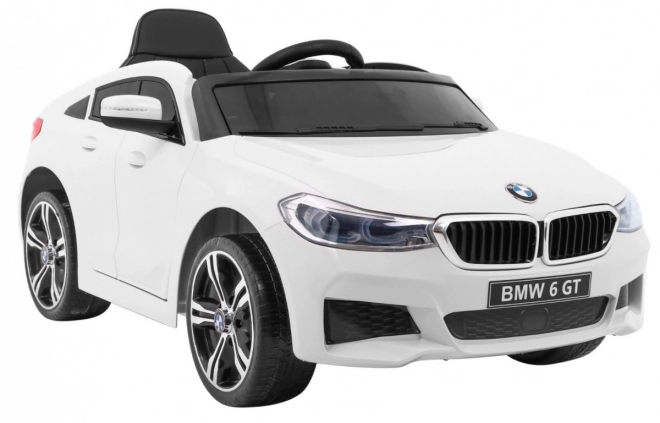 BMW 6 GT Bílé auto na baterie + dálkové ovládání + pomalý start + EVA + pásy + LED MP3