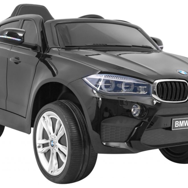 BMW X6M Elektrické dětské auto Lak černá + Dálkové ovládání + EVA + Pomalý start + Audio + LED